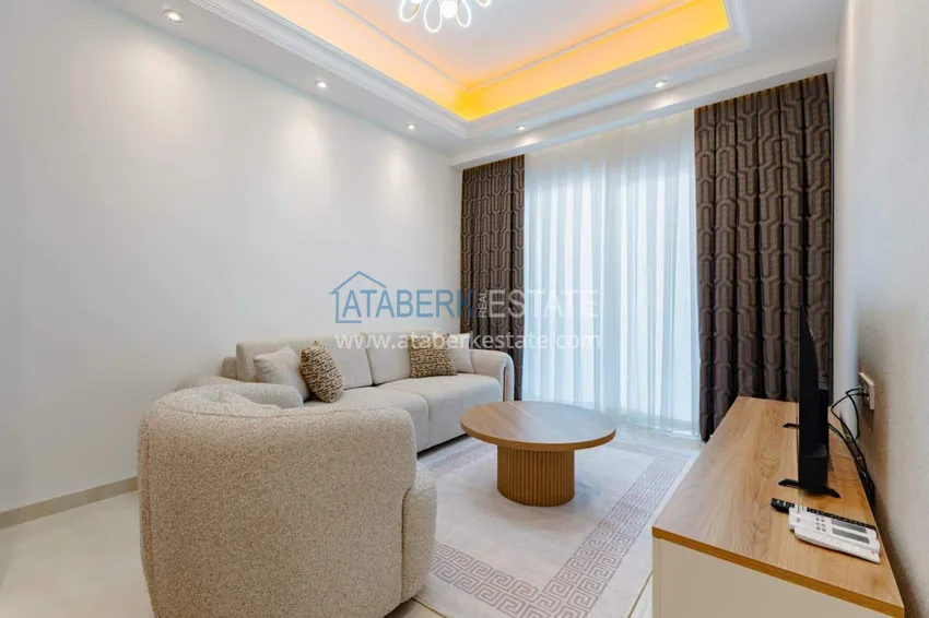 Kupuj  1+1 panoramiczny apartament w centrum Mahmutlar - luksusowe meble, morze w odległości spaceru 9 