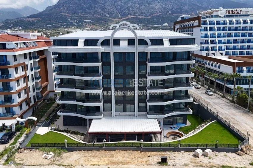 Nowy kompleks mieszkaniowy premium w dzielnicy Alanya - Kestel, pierwsza linia brzegowa 1 