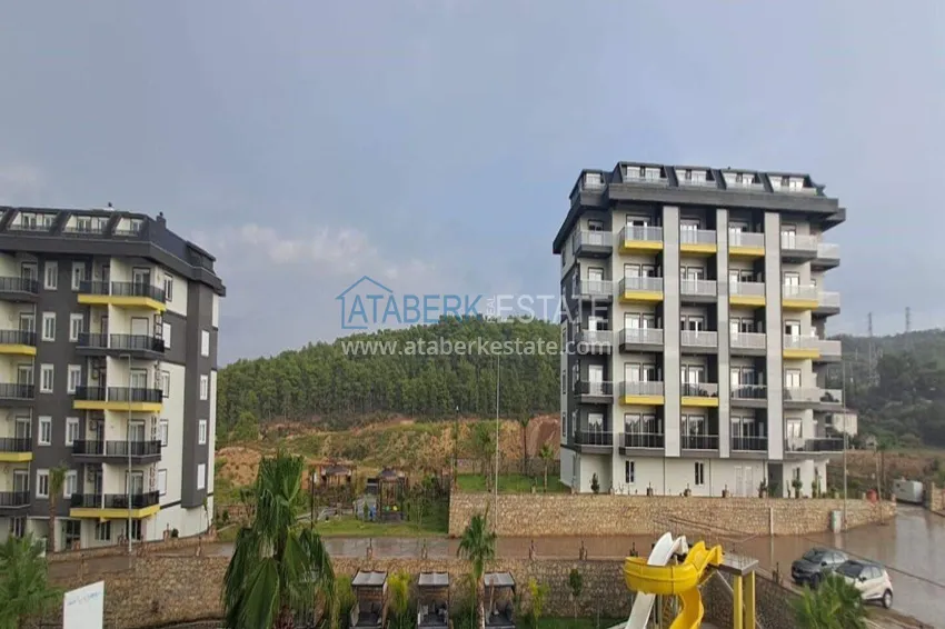 Nieruchomość w Alanyi z ratami do 1 roku - nowy apartament 1+1 z widokiem na morze w Avsallar 10 
