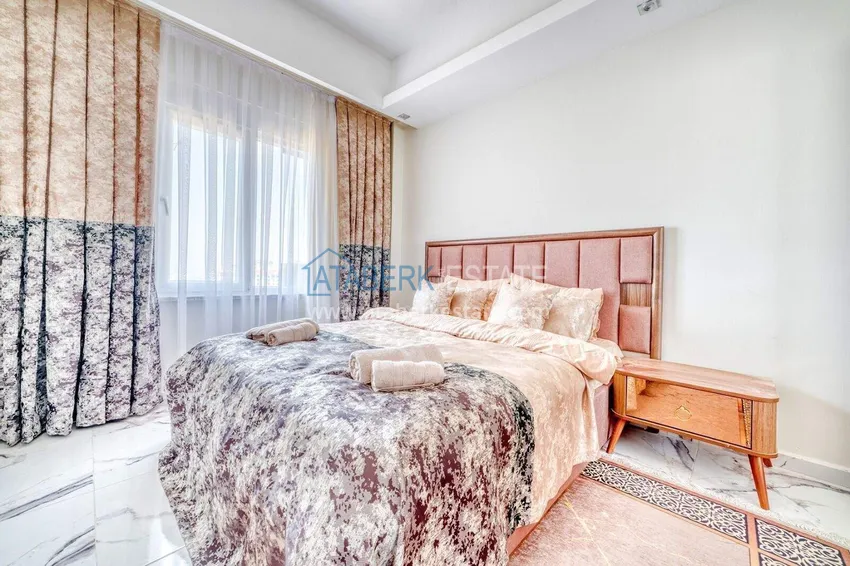 Kupuj  Nieruchomość w Alanyi z ratami do 1 roku - nowy apartament 1+1 z widokiem na morze w Avsallar 10 