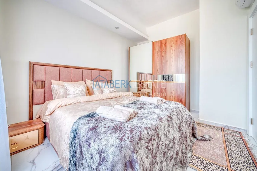 Kupuj  Nieruchomość w Alanyi z ratami do 1 roku - nowy apartament 1+1 z widokiem na morze w Avsallar 11 