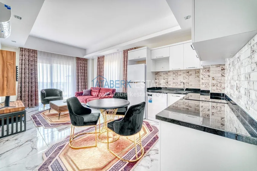 Kupuj  Nieruchomość w Alanyi z ratami do 1 roku - nowy apartament 1+1 z widokiem na morze w Avsallar 7 