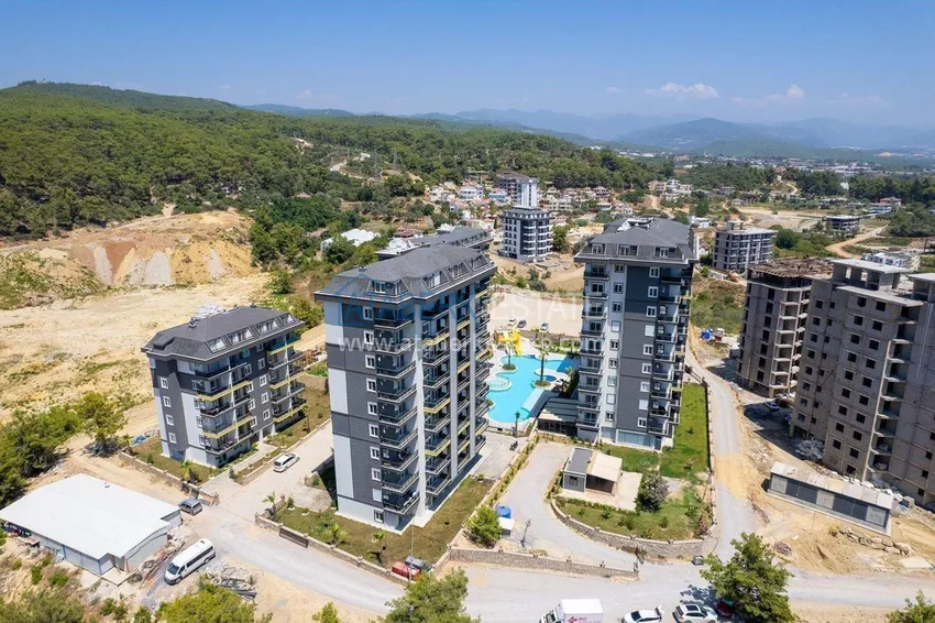 Nieruchomość w Alanyi z ratami do 1 roku - nowy apartament 1+1 z widokiem na morze w Avsallar 7 