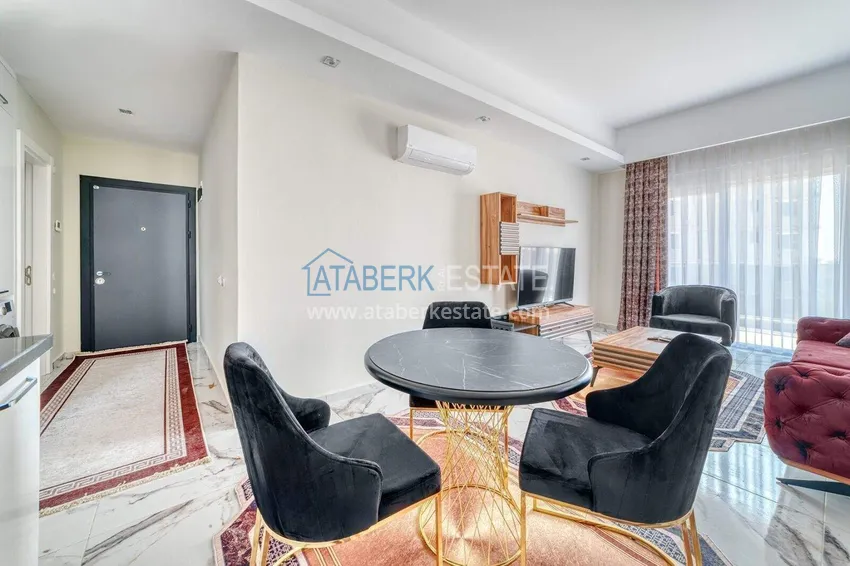 Kupuj  Nieruchomość w Alanyi z ratami do 1 roku - nowy apartament 1+1 z widokiem na morze w Avsallar 9 