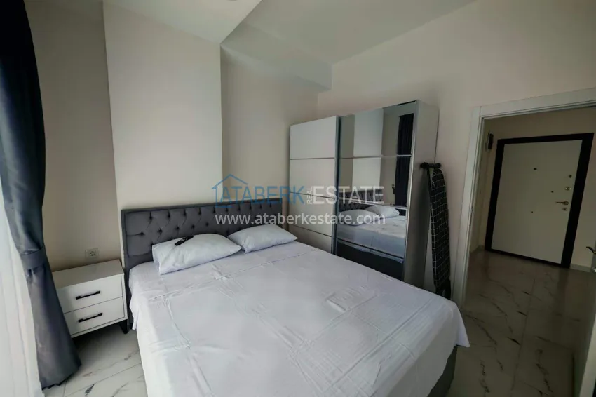 Kupuj  Nieruchomość w Alanyi z licencją na wynajem krótkoterminowy - apartament 1+1 w Avsallar 10 