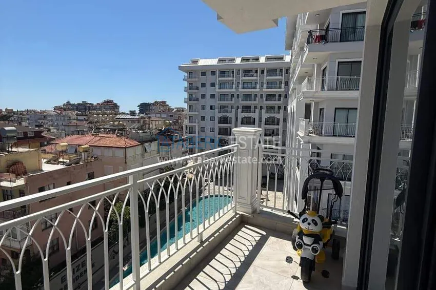 Kupuj  Nieruchomość w centrum Alanyi - apartament 1+1 z widokiem na fortecę i morze w pobliżu plaży Kleopatra 10 