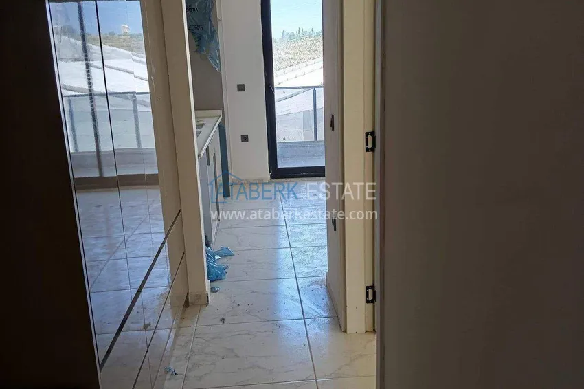 Kupuj  Nieruchomość w Alanyi z widokiem na morze - apartament 1+1 w Mahmutlar 1 
