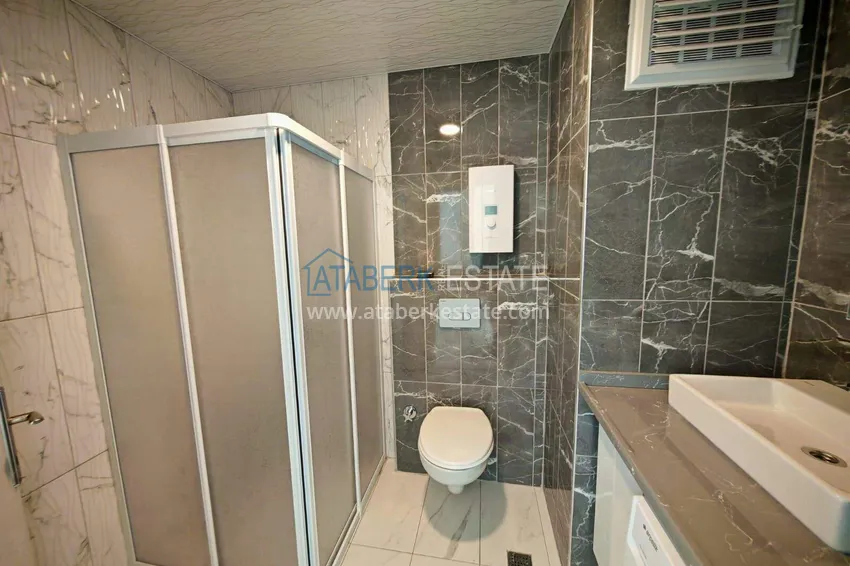 Kupuj  Nieruchomość w Alanyi z licencją na wynajem krótkoterminowy - apartament 1+1 w Avsallar 11 