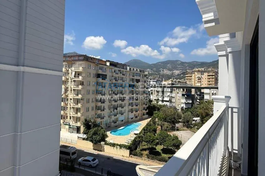 Kupuj  Nieruchomość w centrum Alanyi - apartament 1+1 z widokiem na fortecę i morze w pobliżu plaży Kleopatra 11 
