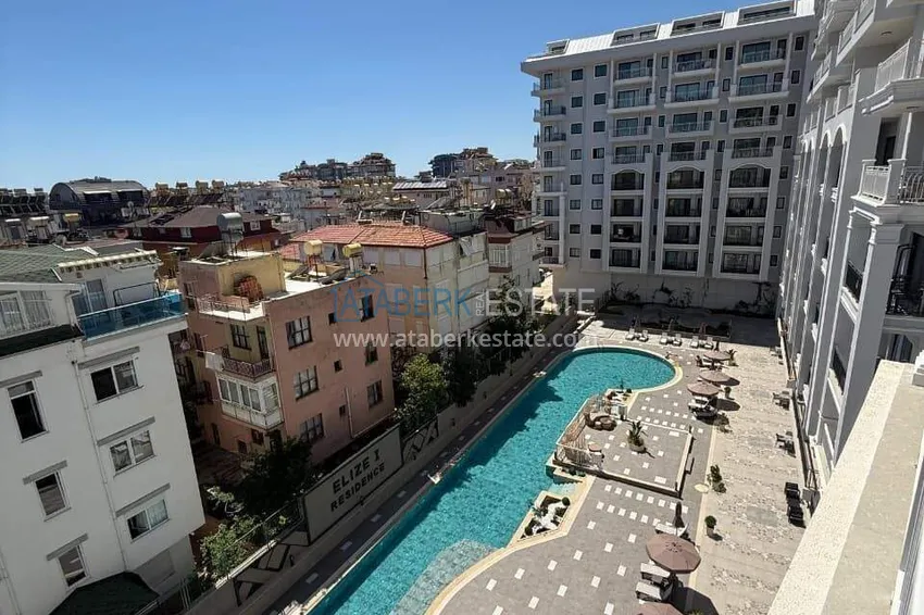 Kupuj  Nieruchomość w centrum Alanyi - apartament 1+1 z widokiem na fortecę i morze w pobliżu plaży Kleopatra 13 
