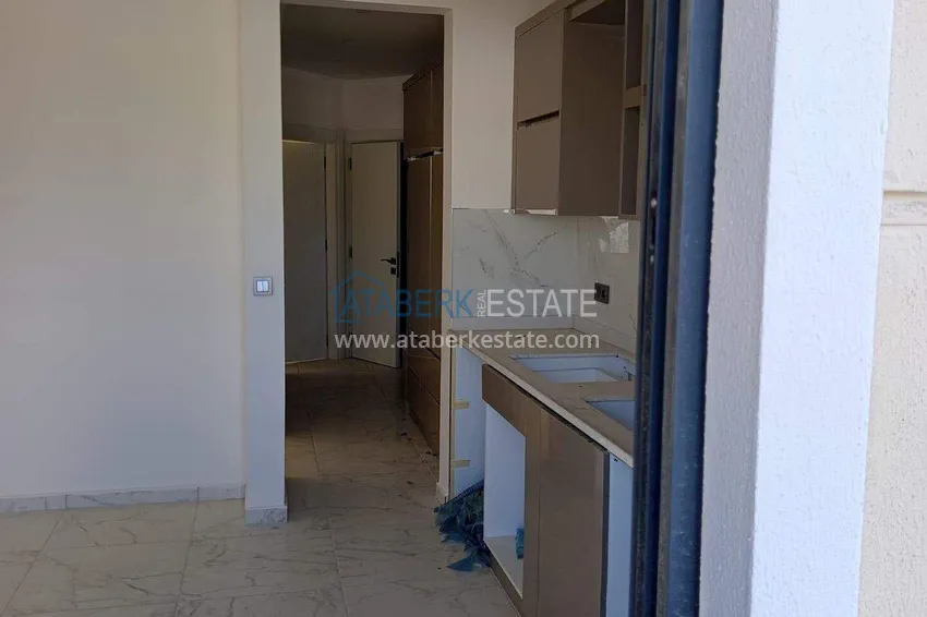 Kupuj  Nieruchomość w Alanyi z widokiem na morze - apartament 1+1 w Mahmutlar 15 