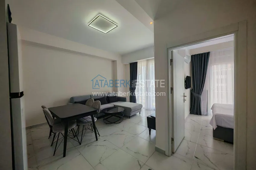 Kupuj  Nieruchomość w Alanyi z licencją na wynajem krótkoterminowy - apartament 1+1 w Avsallar 2 