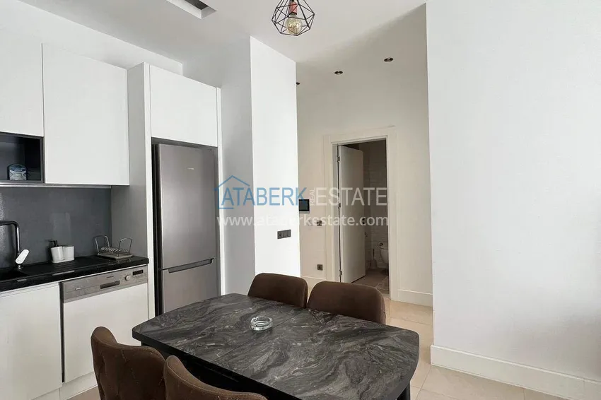 Kupuj  Nieruchomość w centrum Alanyi - apartament 1+1 w luksusowej rezydencji, plaża Kleopatra 2 