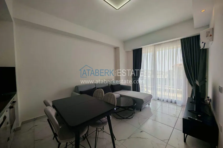 Kupuj  Nieruchomość w Alanyi z licencją na wynajem krótkoterminowy - apartament 1+1 w Avsallar 3 