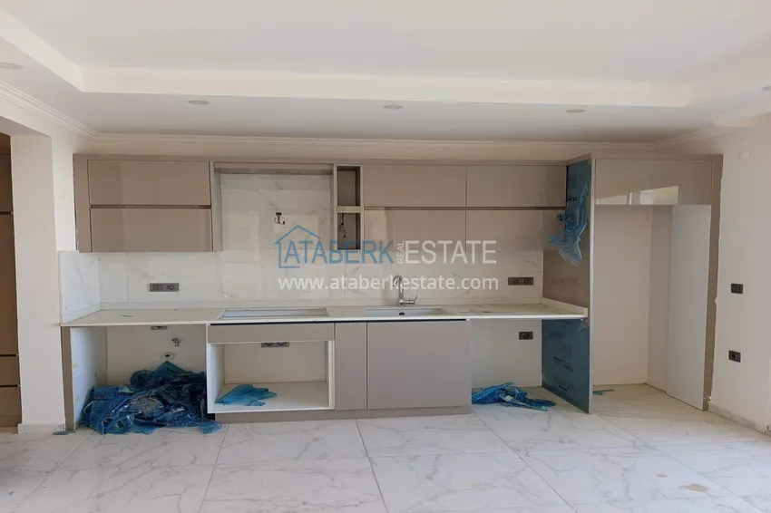 Kupuj  Nieruchomość w Alanyi z widokiem na morze - apartament 1+1 w Mahmutlar 3 