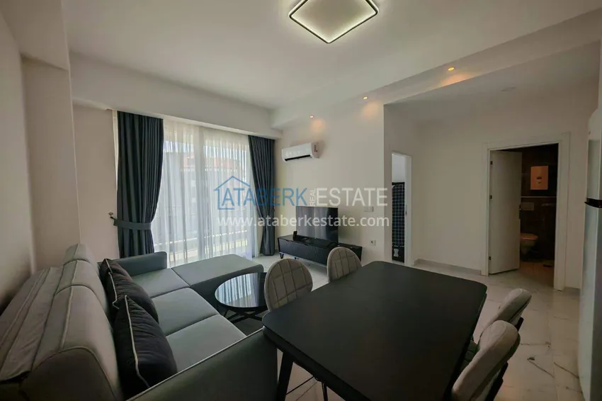Kupuj  Nieruchomość w Alanyi z licencją na wynajem krótkoterminowy - apartament 1+1 w Avsallar 4 