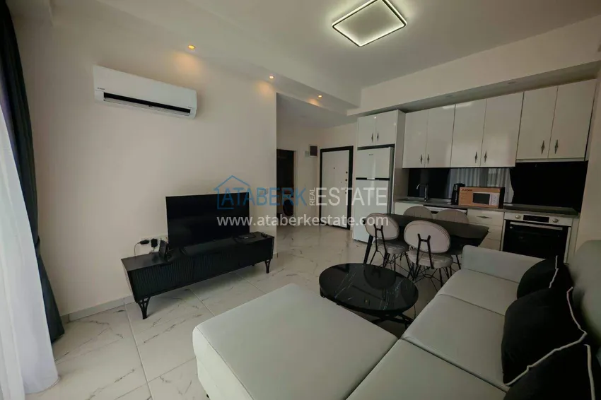Kupuj  Nieruchomość w Alanyi z licencją na wynajem krótkoterminowy - apartament 1+1 w Avsallar 5 