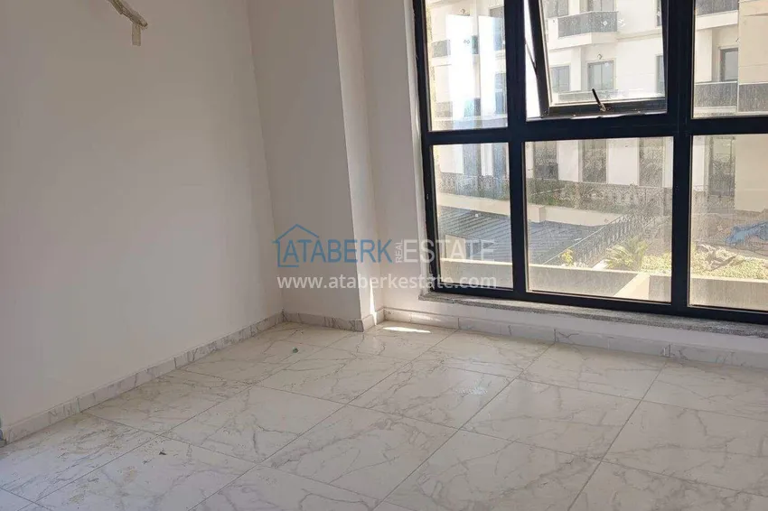 Kupuj  Nieruchomość w Alanyi z widokiem na morze - apartament 1+1 w Mahmutlar 5 