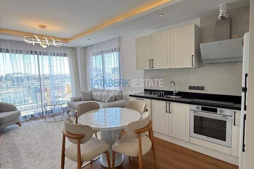 Kupuj  Nieruchomość w centrum Alanyi - apartament 1+1 z widokiem na fortecę i morze w pobliżu plaży Kleopatra 5 
