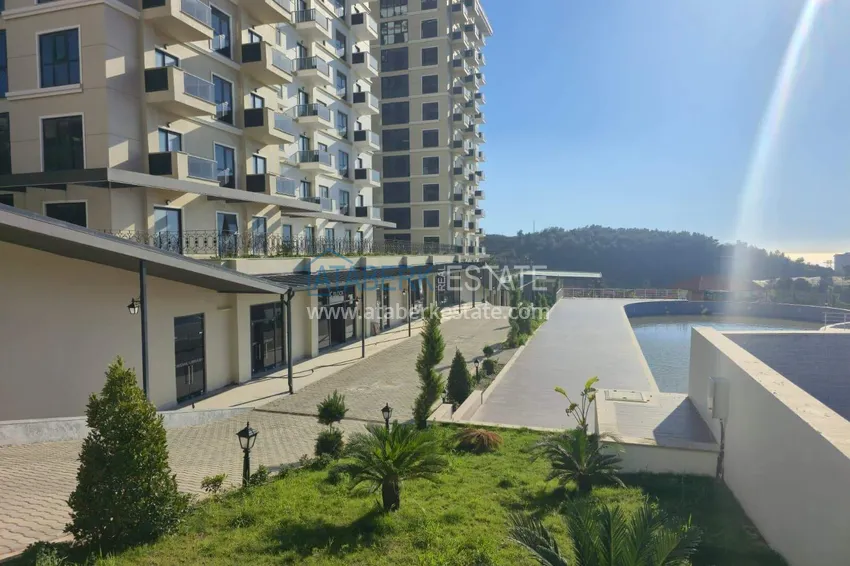 Nieruchomość w Alanyi z widokiem na morze - apartament 1+1 w Mahmutlar 6 