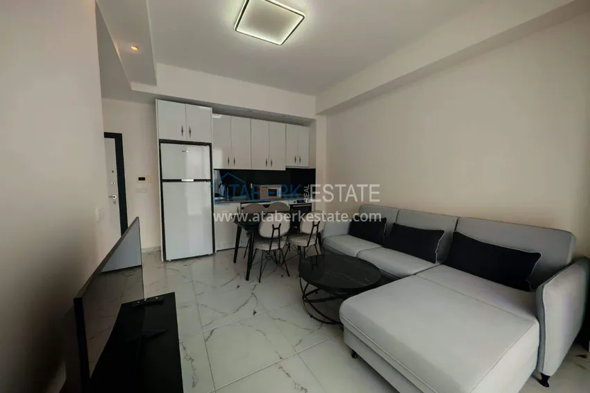 Kupuj  Nieruchomość w Alanyi z licencją na wynajem krótkoterminowy - apartament 1+1 w Avsallar 6 