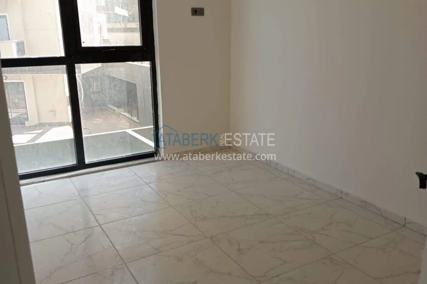 Kupuj  Nieruchomość w Alanyi z widokiem na morze - apartament 1+1 w Mahmutlar 6 