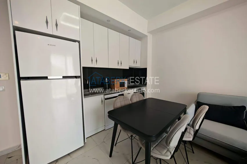 Kupuj  Nieruchomość w Alanyi z licencją na wynajem krótkoterminowy - apartament 1+1 w Avsallar 7 