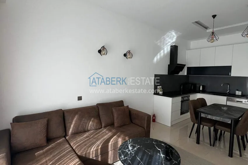 Kupuj  Nieruchomość w centrum Alanyi - apartament 1+1 w luksusowej rezydencji, plaża Kleopatra 7 