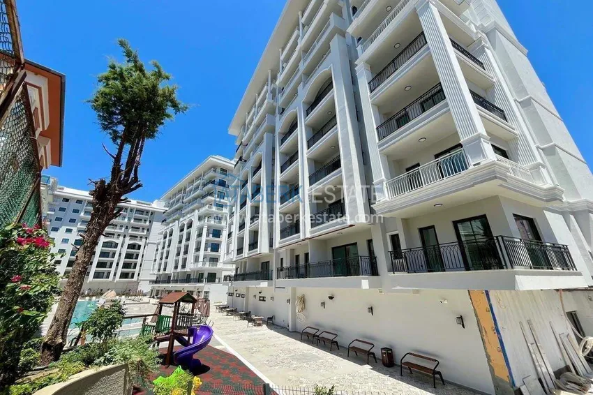 Nieruchomość w centrum Alanyi - apartament 1+1 z widokiem na fortecę i morze w pobliżu plaży Kleopatra 8 