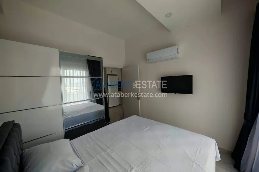 Kupuj  Nieruchomość w Alanyi z licencją na wynajem krótkoterminowy - apartament 1+1 w Avsallar 9 