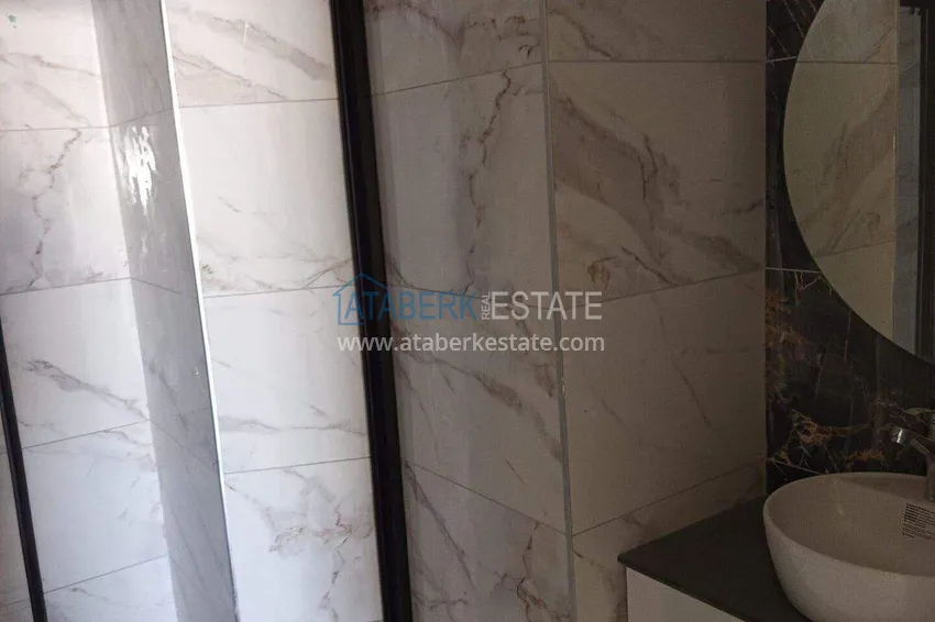 Kupuj  Nieruchomość w Alanyi z widokiem na morze - apartament 1+1 w Mahmutlar 9 