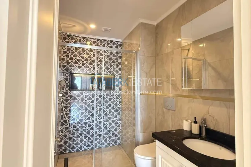 Kupuj  Nieruchomość w centrum Alanyi - apartament 1+1 z widokiem na fortecę i morze w pobliżu plaży Kleopatra 9 