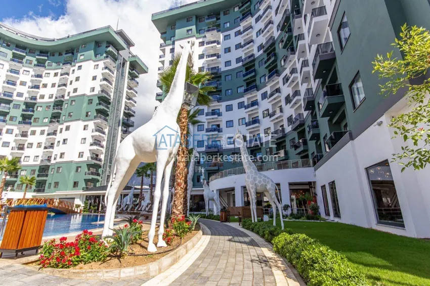 Apartament 1+1 w Alanya, dzielnica Mahmutlar — meble, widok na góry 14 