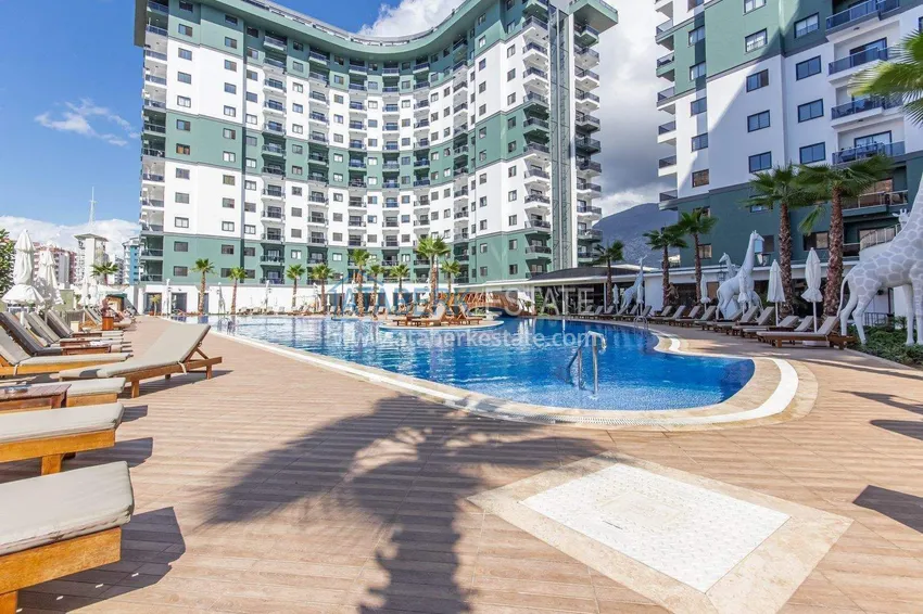 Apartament 1+1 w Alanya, dzielnica Mahmutlar — meble, widok na góry 16 