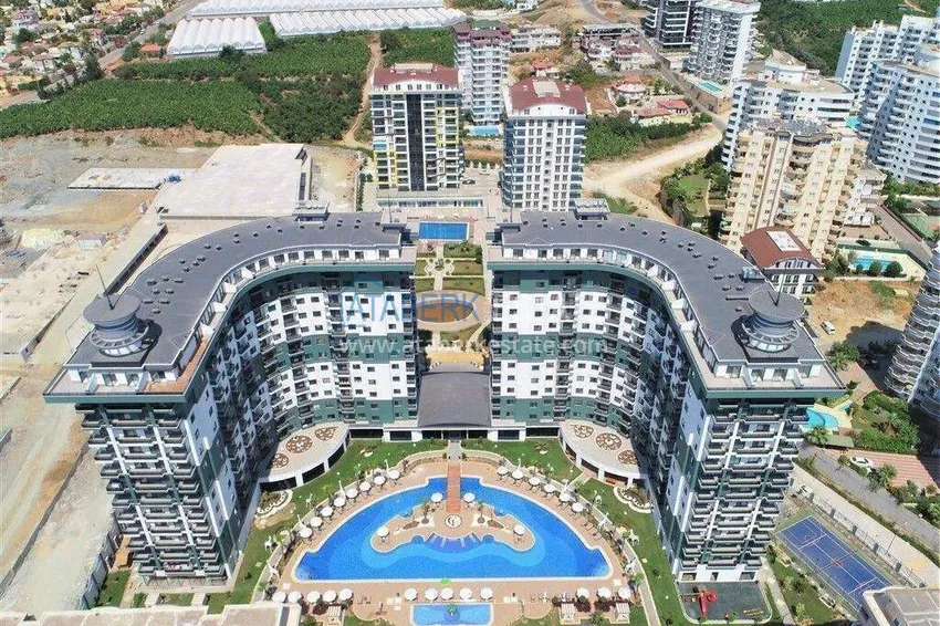 Apartament 1+1 w Alanya, dzielnica Mahmutlar — meble, widok na góry 2 
