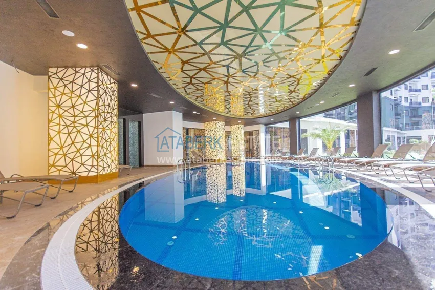 Apartament 1+1 w Alanya, dzielnica Mahmutlar — meble, widok na góry 47 