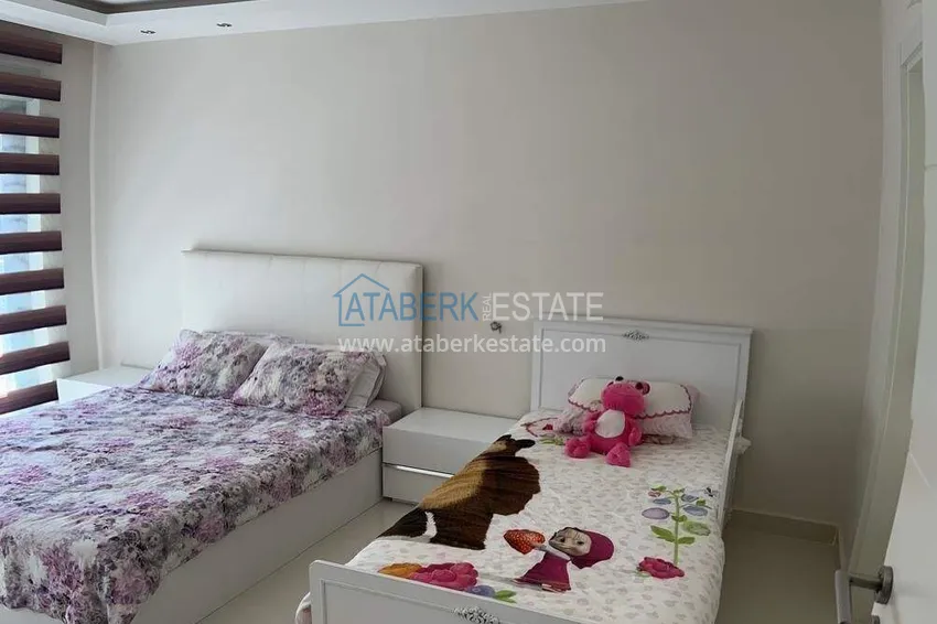 Kupuj  Apartament 2+1 na pierwszej linii w Alanyi, dzielnica Kargicak — meble, boczny widok na morze 10 