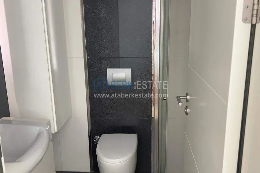 Kupuj  Apartament 2+1 na pierwszej linii w Alanyi, dzielnica Kargicak — meble, boczny widok na morze 17 