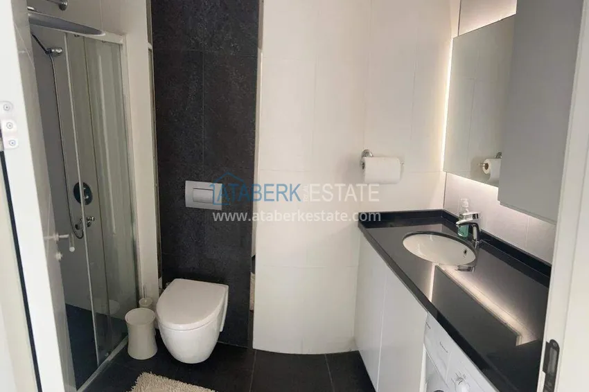 Kupuj  Apartament 2+1 na pierwszej linii w Alanyi, dzielnica Kargicak — meble, boczny widok na morze 19 