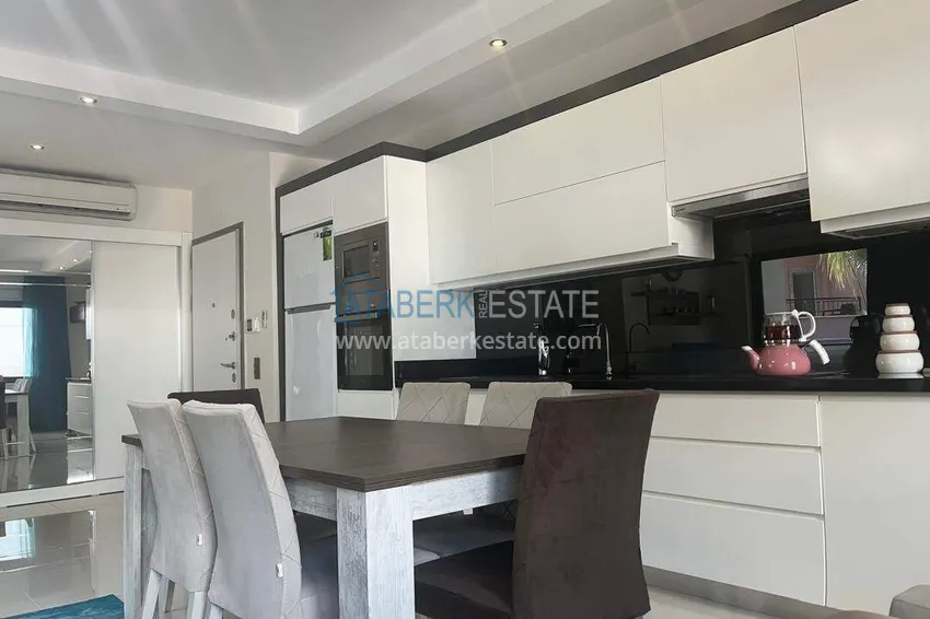Kupuj  Apartament 2+1 na pierwszej linii w Alanyi, dzielnica Kargicak — meble, boczny widok na morze 2 