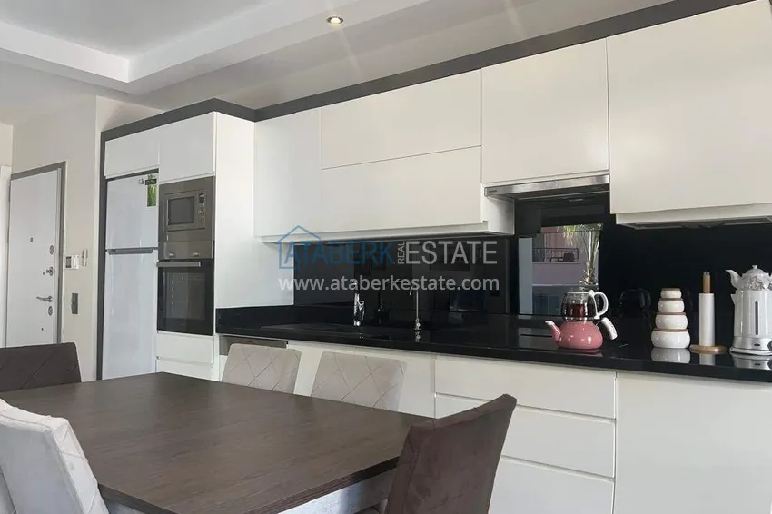 Kupuj  Apartament 2+1 na pierwszej linii w Alanyi, dzielnica Kargicak — meble, boczny widok na morze 3 