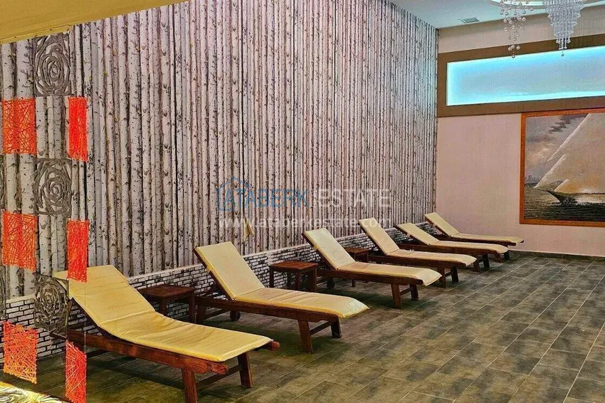 Apartament 2+1 na pierwszej linii w Alanyi, dzielnica Kargicak — meble, boczny widok na morze 43 