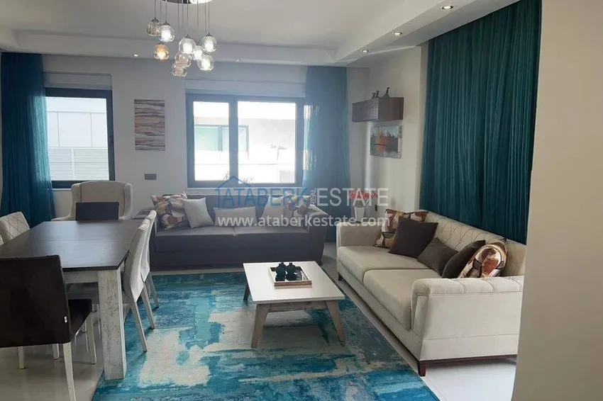 Kupuj  Apartament 2+1 na pierwszej linii w Alanyi, dzielnica Kargicak — meble, boczny widok na morze 8 