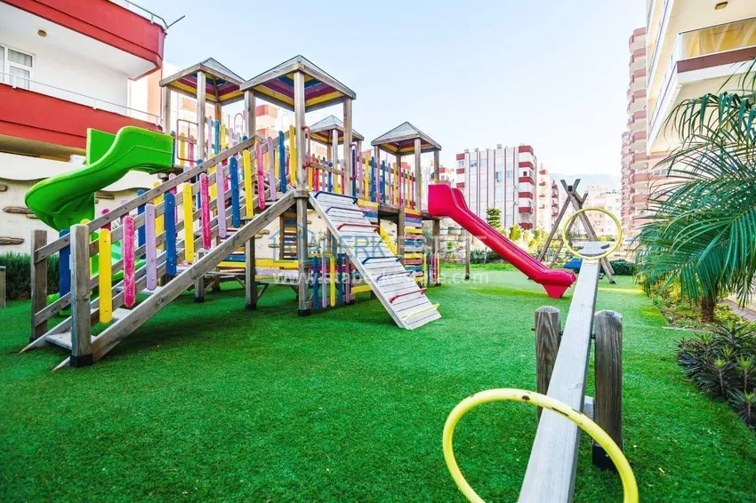 Apartament 1+1 w centrum Mahmutlar — meble, przeszklony balkon, 200 metrów od morza  12 