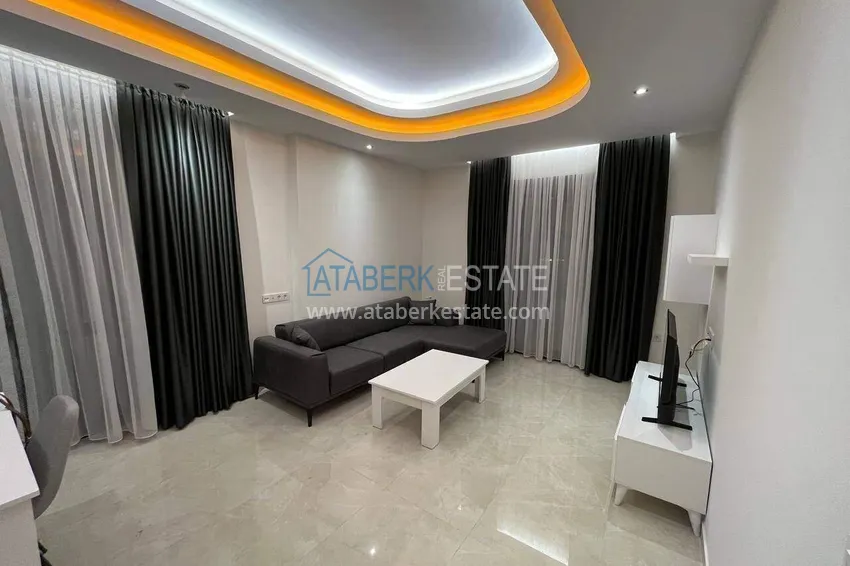 Kupuj  Apartament 2+1 w centrum Alanyi, umeblowany w luksusowym kompleksie, plaża Kleopatra  1 