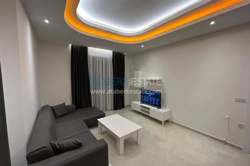 Kupuj  Apartament 2+1 w centrum Alanyi, umeblowany w luksusowym kompleksie, plaża Kleopatra  2 