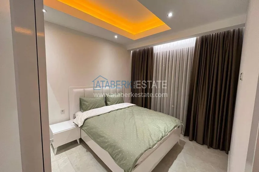 Kupuj  Apartament 2+1 w centrum Alanyi, umeblowany w luksusowym kompleksie, plaża Kleopatra  7 