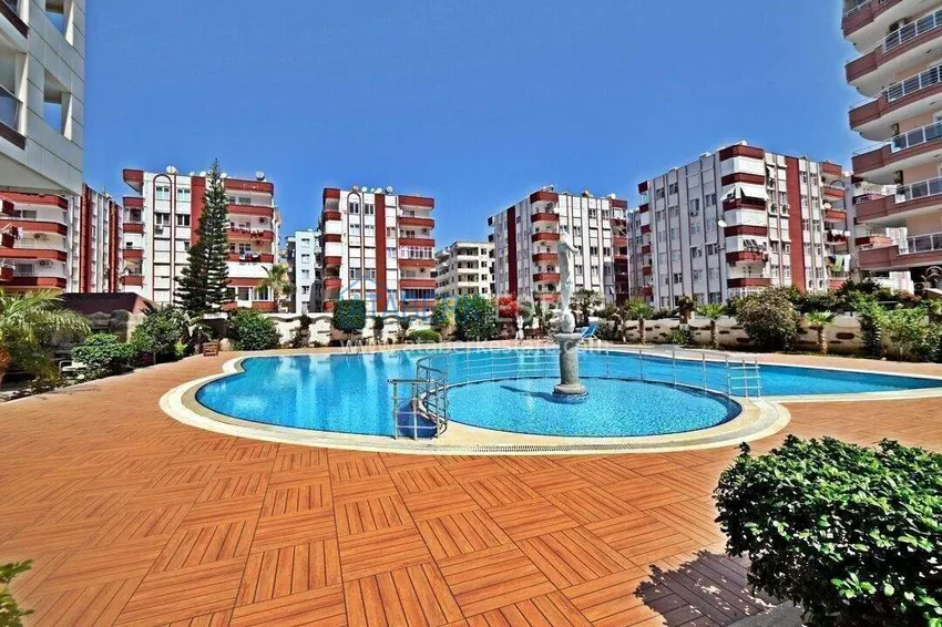 Apartament 1+1 w centrum Mahmutlar — meble, przeszklony balkon, 200 metrów od morza  10 