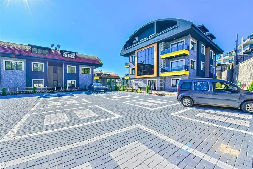 Apartament na pobyt w centrum Alanyi - dwupoziomowy taras 2+1 w kompleksie klasy komfortowej 12 