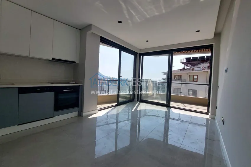 Kupuj  Apartament 1+1 w centrum Alanyi - z widokiem na morze i fortecę, plaża Kleopatra 2 